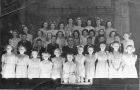 Concert in Hall.Back Row L-R: Mgt Reid, Moira Michie, Edna Wood, Kathleen Pirie, Edith Whyte, Mura Scott, Lottie Thomson, Mgt Taylor. 2nd row: Zena Morrison, Ella Murison, Mgt Brown, Mary Gerrard,